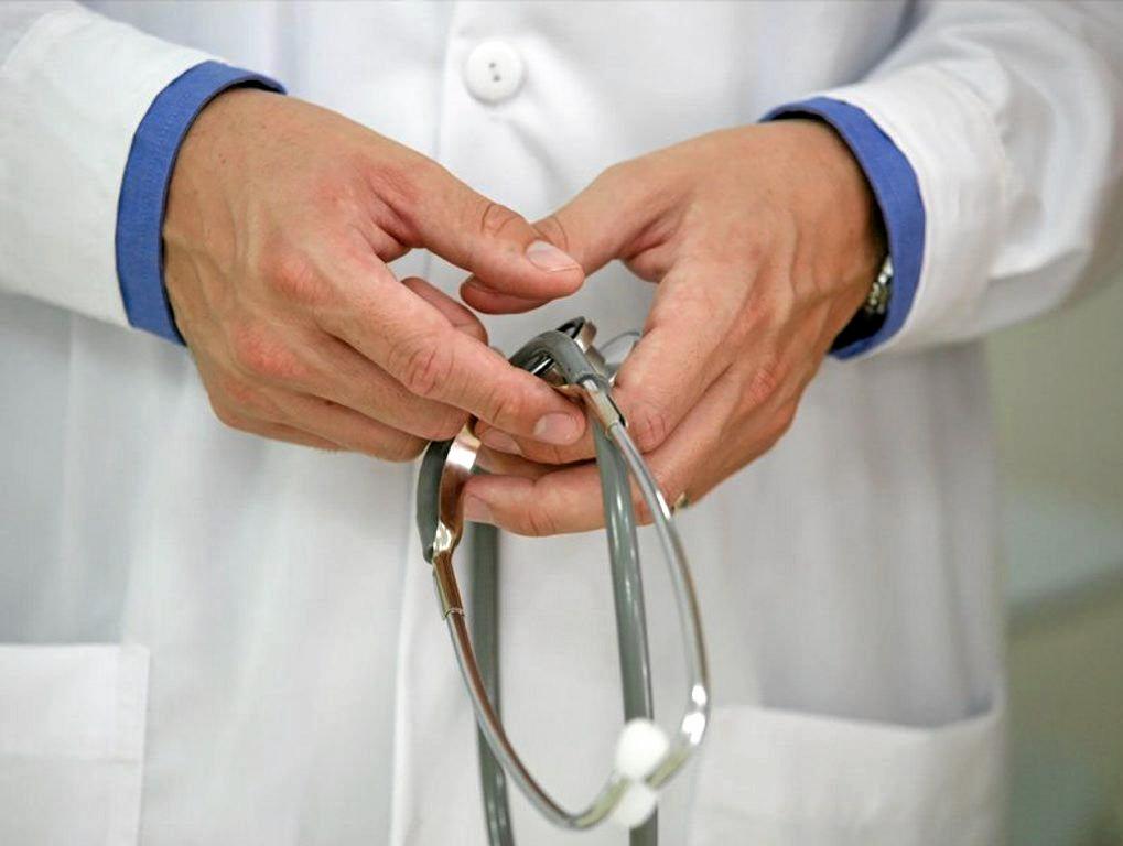 Medical Professional holding stethoscope
